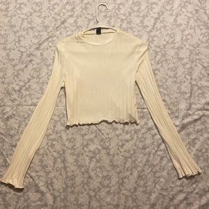 Long sleeve cream colored crop top